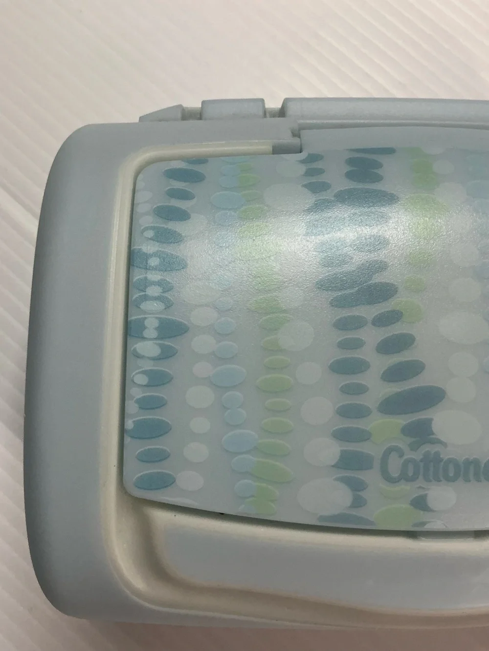 Cottonelle Mostly Colored Blue w/ Green with Word Logo Print Top Pop-Up Dispense